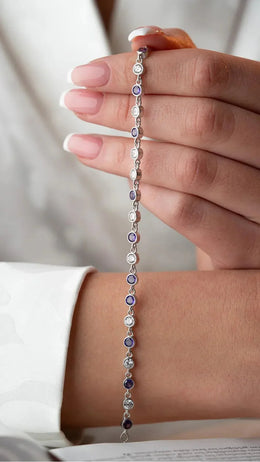 Silver Rhodium-Plated Round Design Bracelet with Purple Stone”