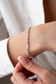 Silver Rhodium-Plated Round Design Bracelet with Purple Stone”