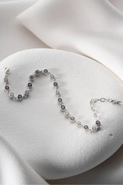 Silver Rhodium-Plated Round Design Bracelet with Purple Stone”