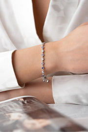 Silver Rhodium-Plated Round Design Bracelet with Purple Stone”
