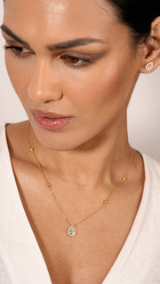 gold round necklace