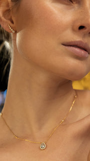 gold round necklace