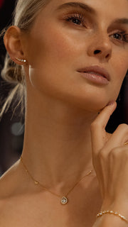 gold round necklace