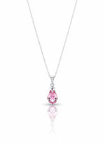 The Sewar Apex Pendant, a sterling silver necklace featuring the brand's signature geometric pyramid S-pattern icon as the central pendant. The necklace is displayed on a soft neutral background.