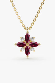 A sterling silver necklace with a circular pendant featuring a minimalist cutout of a mother holding a child, displayed against a soft neutral background.