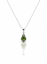 A sterling silver necklace with a circular pendant on a soft neutral background. The pendant has a high-polish finish and features a cutout star at its center.