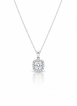 A sterling silver necklace with a solid, round disc pendant that has a rough, stone-like texture. The necklace is displayed against a soft neutral background.